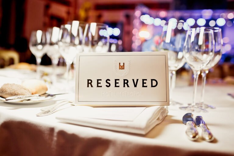 Reserved sign on a table in restaurant