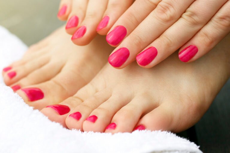 Red manicure and pedicure